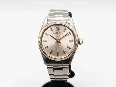Rolex $8000 ROLEX Oyster Perpetual 14k Yellow