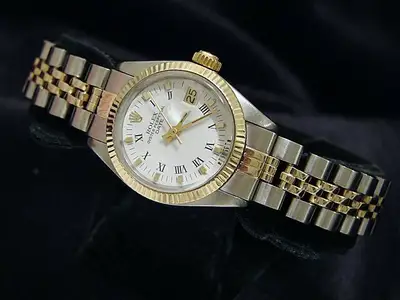 Rolex Date 6917 14K Gold Steel