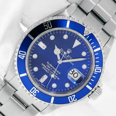 Rolex ROLEX SUBMARINER DATE STAINLESS STEEL WATCH WITH BLUE DIAMOND DIAL BLUE INSERT