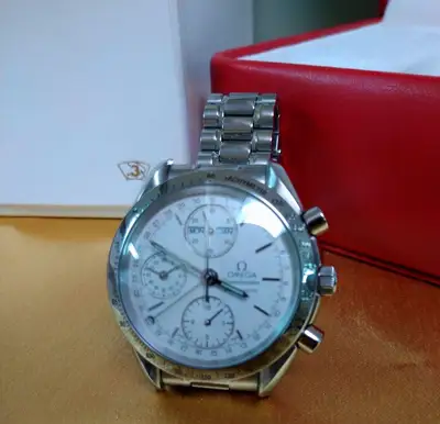 Omega Speedmaster Day Date 7751