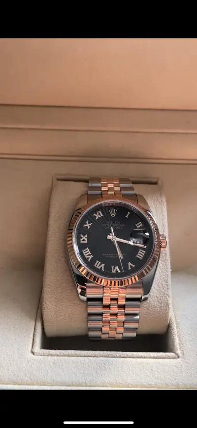 Rolex steel-rosegold jubilee, fluted bezel sundial