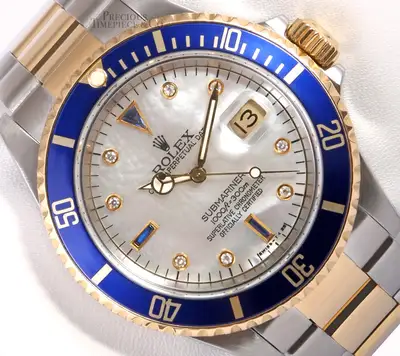 Rolex Rolex Submariner Date 16613 S/Steel Gold Blue Insert-White MOP Diamond Dial
