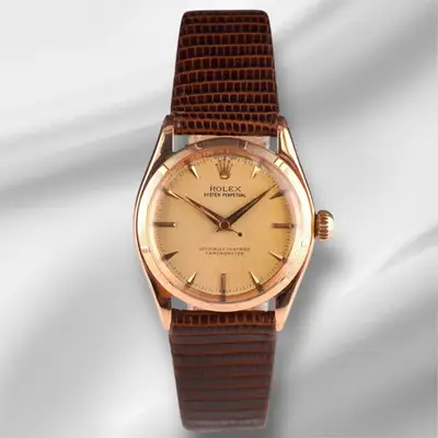 Rolex Oyster Perpetual 18K Yellow Gold