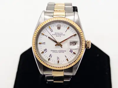 Rolex $15,000 DATE WHITE ROMAN 14k