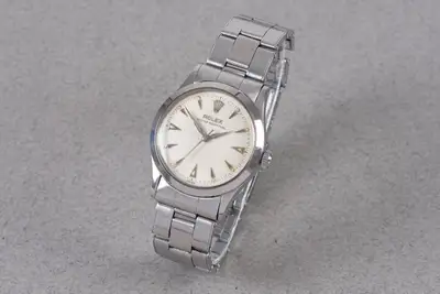 Rolex OYSTER PERPETUAL FLAT SIDE REF
