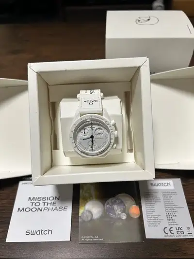 Omega swatch Omega Speedmaster Moonswatch Snoopy Edition