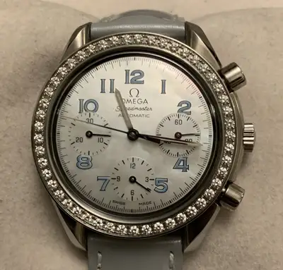 Omega speedmaster mothe of pearl diamond