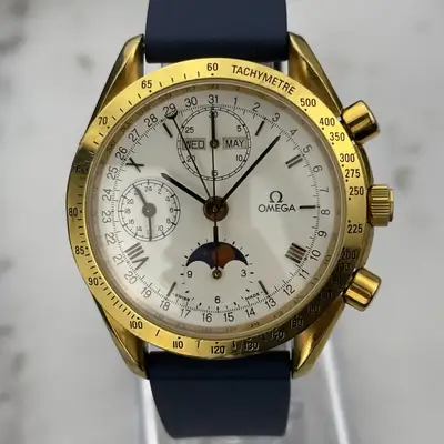 Omega 's Omega Speedmaster Calendar Moonphase Gold