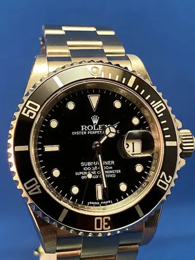 Rolex ROLEX 16610 STAINLESS STEEL SUBMARINER 100% NEW, COMPLETE SET ENGRAVED REHAUTE