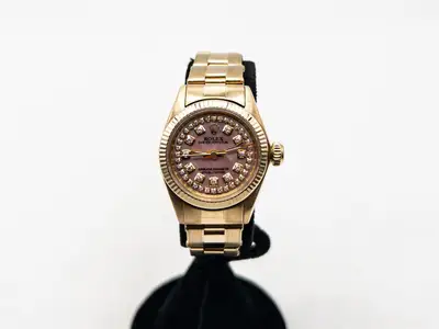 Rolex $25,000 Rolex Oyster Perpetual PINK MOP