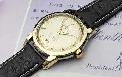 Omega 14K SS Omega Seamaster calendar bumper