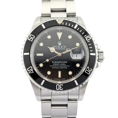 Rolex 168000 Submariner Date Triple Zero
