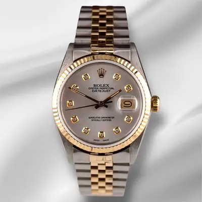 Rolex Datejust 18k YG Steel Fluted