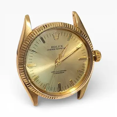 Rolex Oyster Perpetual 18K Yellow Gold