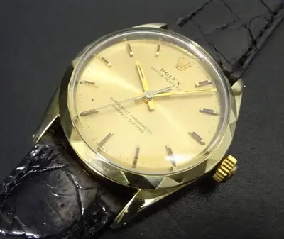 Rolex Oyster Perpetual 1025 Triangle Bezel