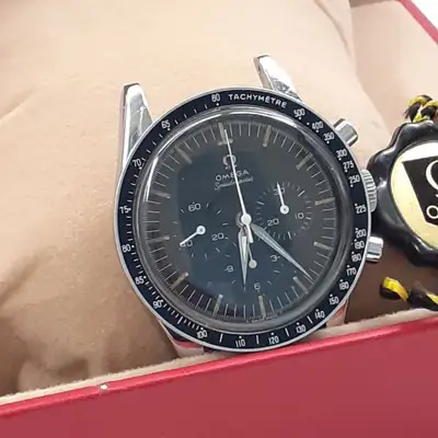 Omega W/ Collectable Omega Speedmaster Steel Head