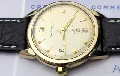 Omega 14K G/F Omega Seamaster calendar bumper