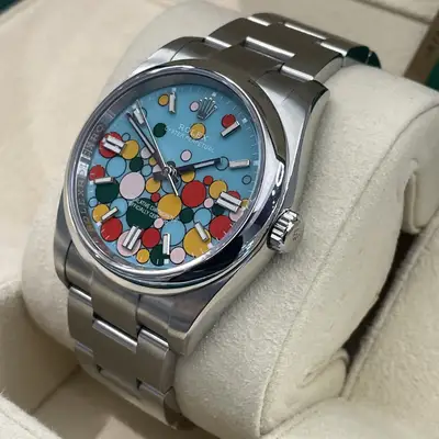 Rolex OYSTER PERPETUAL TURQUOISE BLUE ref: