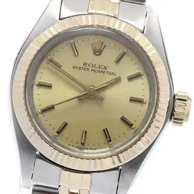 Rolex Oyster perpetual 6719 YG bezel