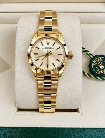 Rolex OYSTER PERPETUAL YELLOW GOLD AND