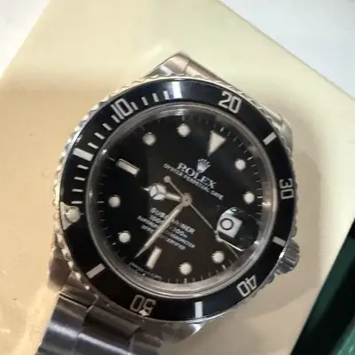 Rolex Submariner Date Model 168000 Featuring