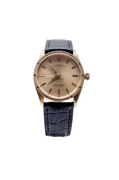 Rolex Oyster Perpetual 18k Gold Ref: