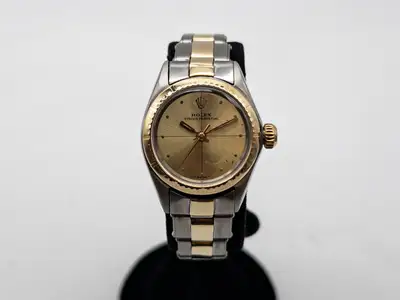 Rolex $8000 ROLEX OYSTER PERPETUAL Chamapgne 18k