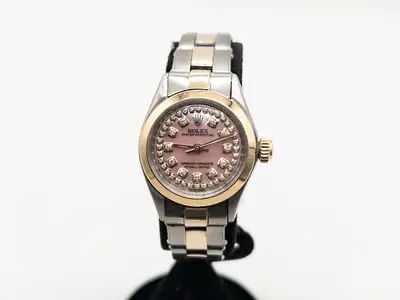 Rolex $10,000 ROLEX Oyster Perpetual PINK MOP