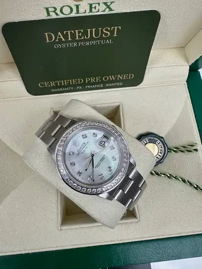 Rolex CERTIFIED STUNNING DATE STEEL AND