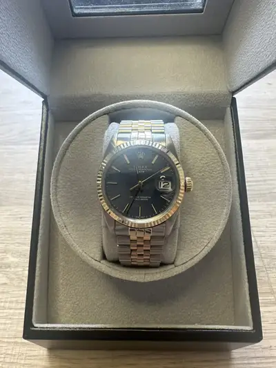 Rolex OYSTER PERPETUAL IN STEEL GOLD