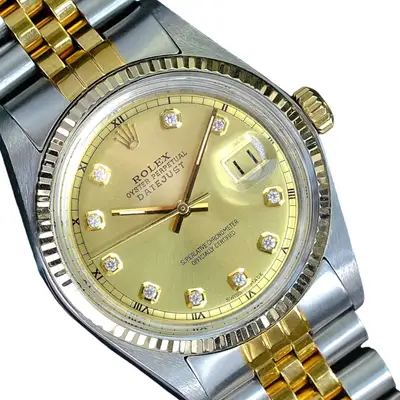 Rolex Datejust Gold Steel Champagne Fluted