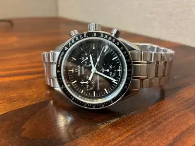 Omega Swatch Speedmaster Glass